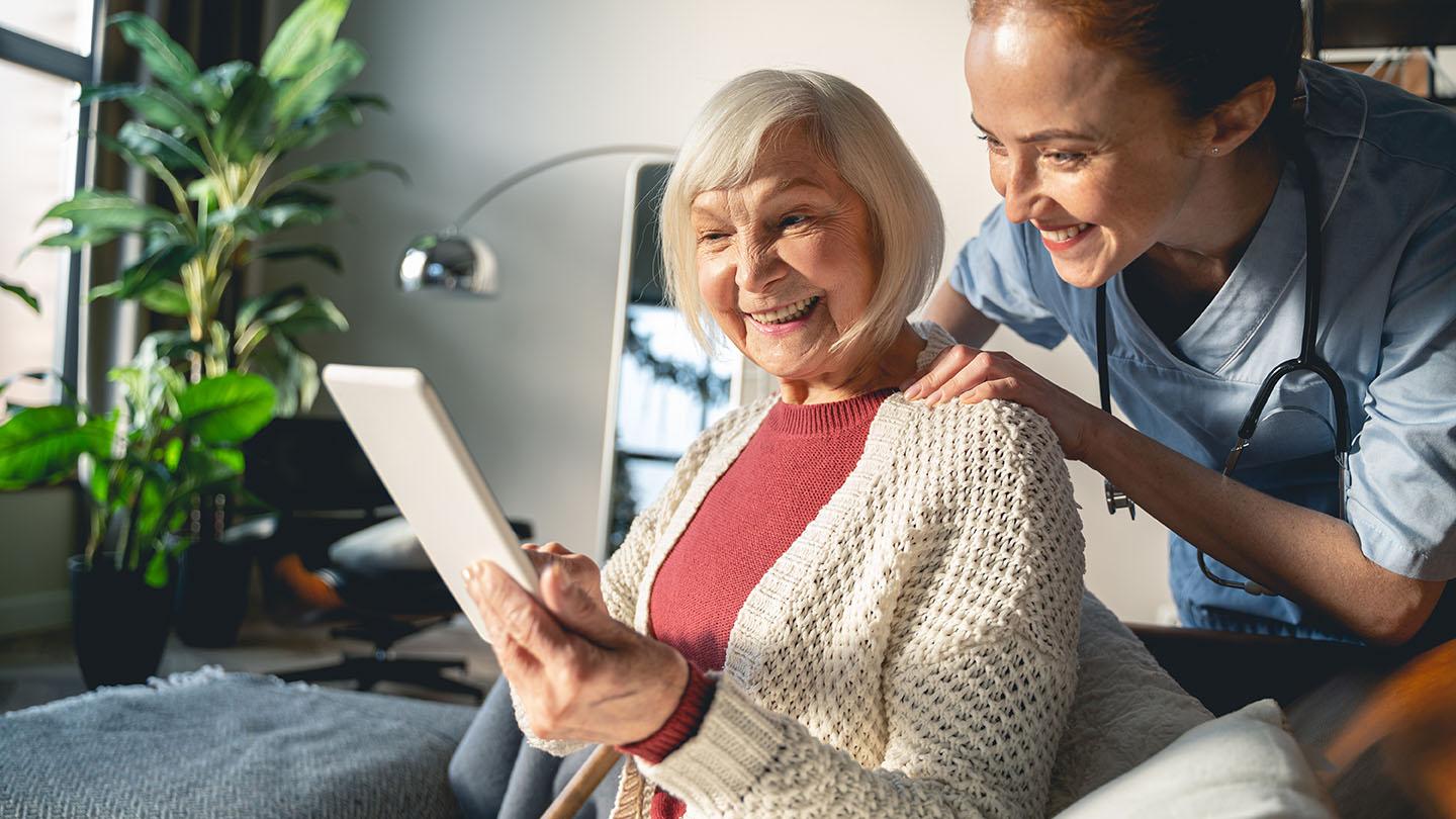 Customer using a tablet with a healthcare specialist