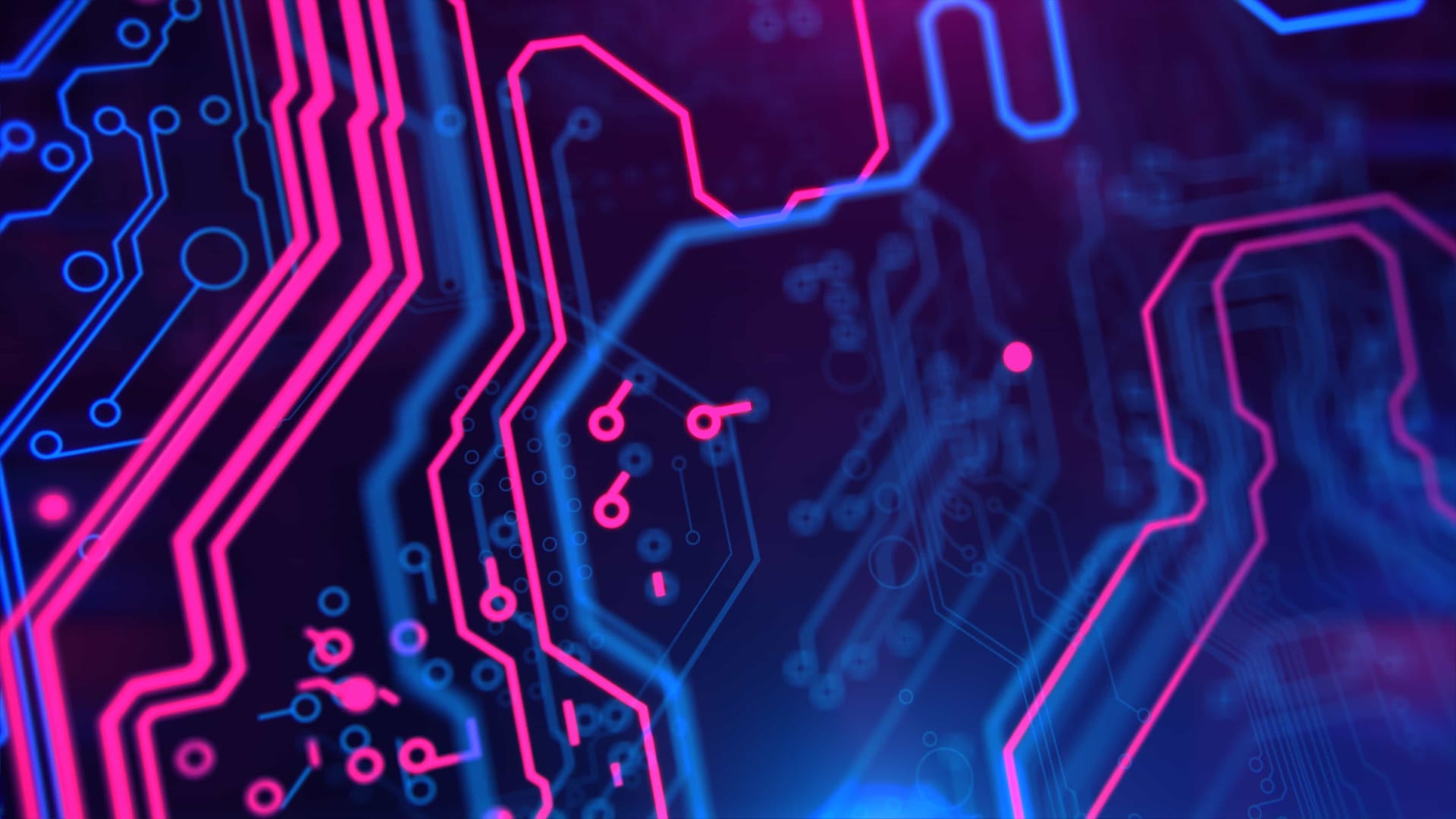 Close-up of circuit board patterns with glowing pink and blue lines against a dark purple background.